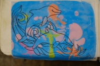 Работы, выполненные по методике рисования на воде (со специальным шаблоном) - "Дельфины"