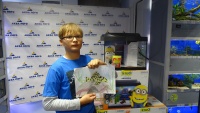 Победитель конкурса Артёмов Роман получил в подарок аквариум Tetra с миньонами.